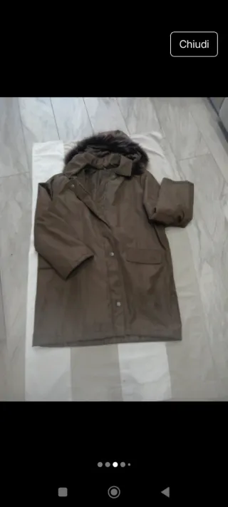 Giacca con cappuccio e pelliccia