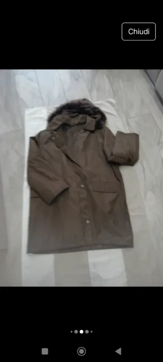 Giacca con cappuccio e pelliccia