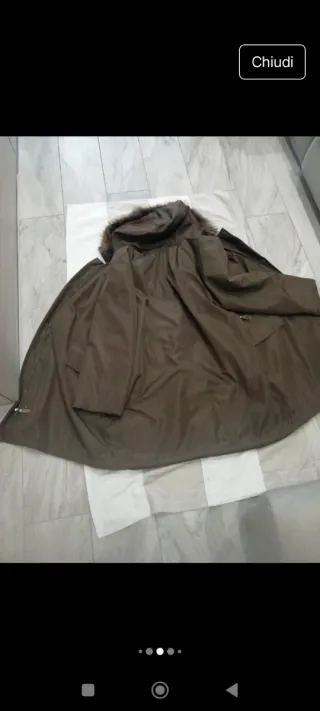 Giacca con cappuccio e pelliccia