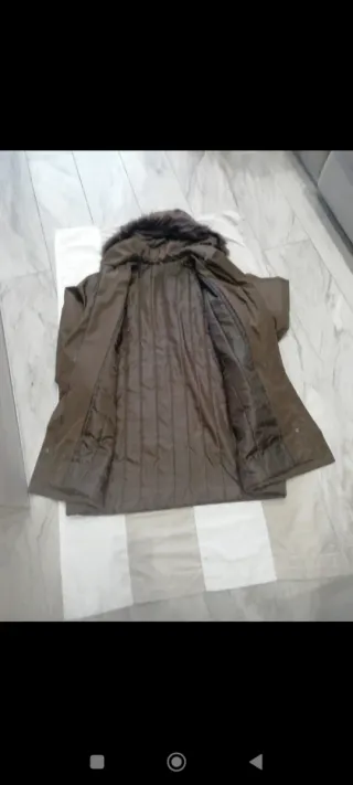 Giacca con cappuccio e pelliccia