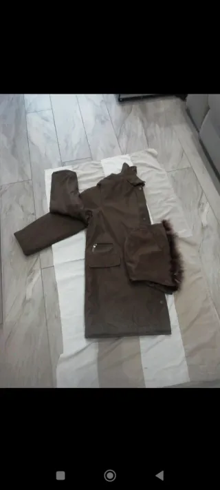 Giacca con cappuccio e pelliccia