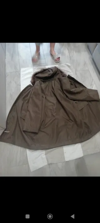 Giacca con cappuccio e pelliccia