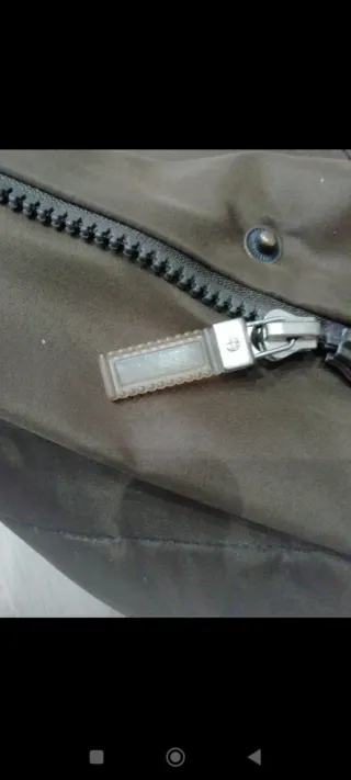 Giacca con cappuccio e pelliccia