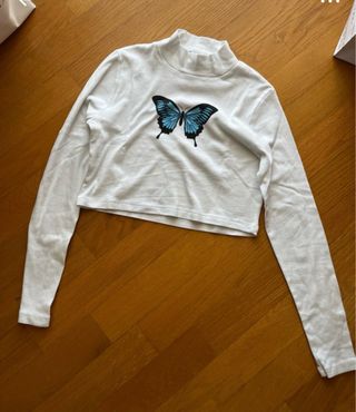 Maglia Subdued crop farfalla blu