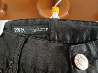 Pantalón Zara plateado , negro