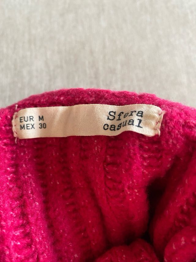 Jersey fucsia cuello alto tejido