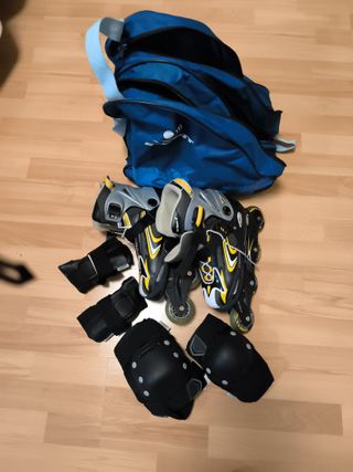 Patines en línea + protecciones + bolsa