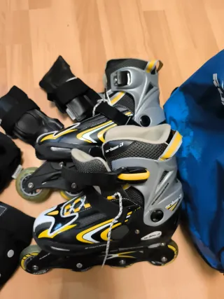 Patines en línea + protecciones + bolsa