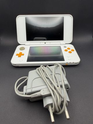 Nintendo New 2DS XL Bianco e Arancio + mario kart