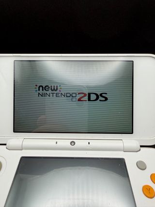 Nintendo New 2DS XL Bianco e Arancio + mario kart