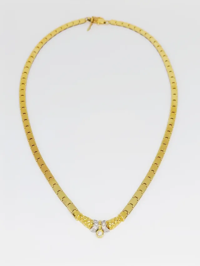 Gargantilla de oro bicolor 18k con diamantes.