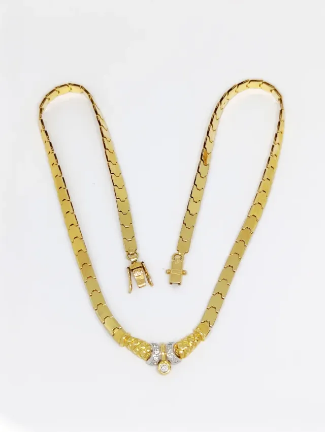 Gargantilla de oro bicolor 18k con diamantes.