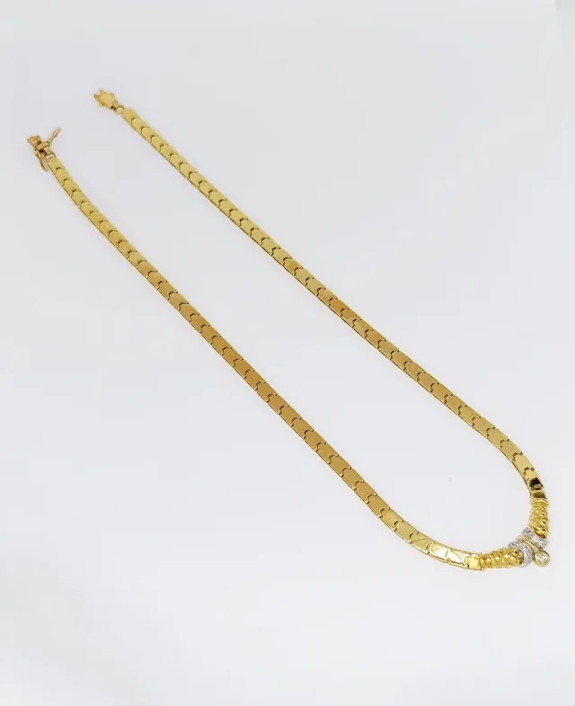 Gargantilla de oro bicolor 18k con diamantes.