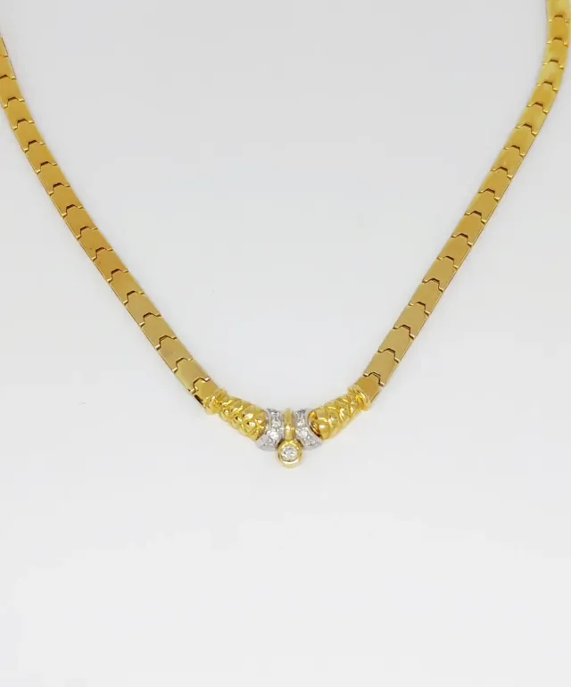 Gargantilla de oro bicolor 18k con diamantes.
