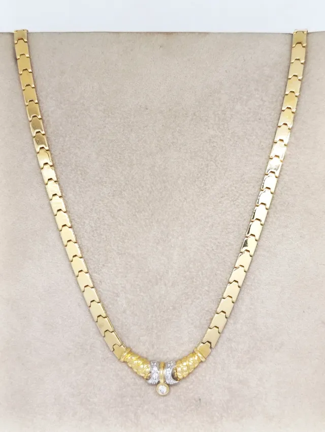 Gargantilla de oro bicolor 18k con diamantes.