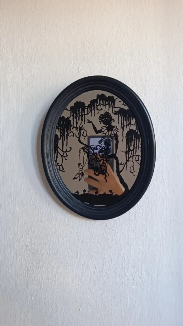 Espejo ovalado decorativo negro