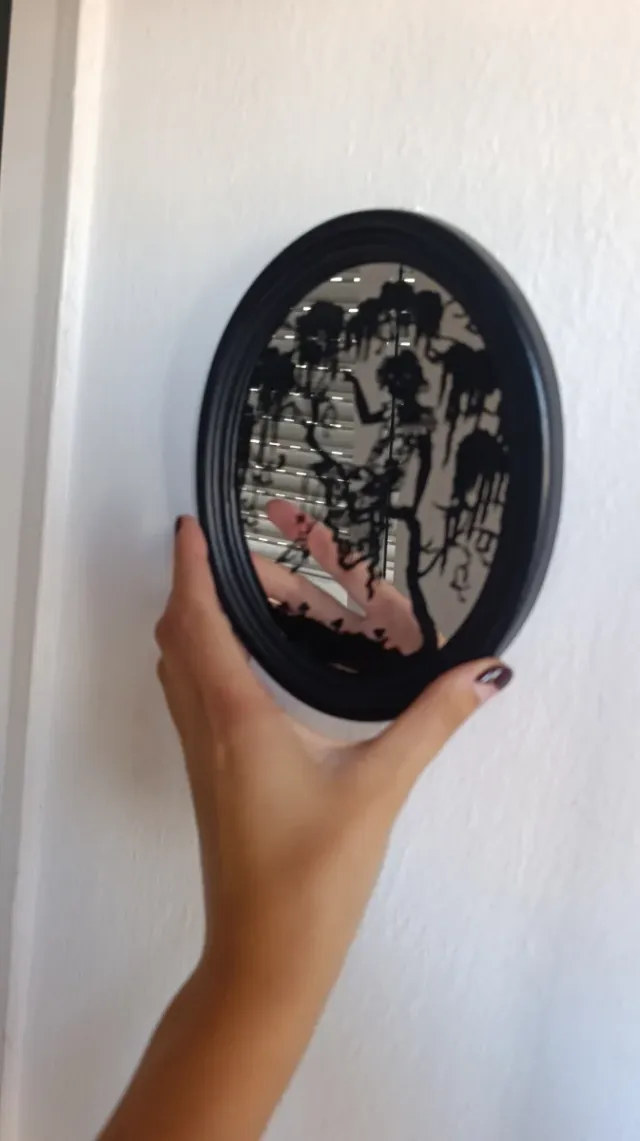 Espejo ovalado decorativo negro