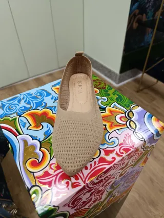 Zapatos planos de punto beige