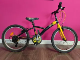 Bicicleta infantil Btwin negra y amarilla