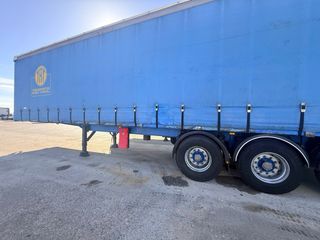 Semirremolque Tauliner Portabobinas