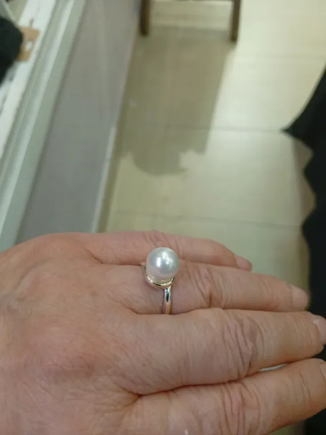 Anillo de acero con perla