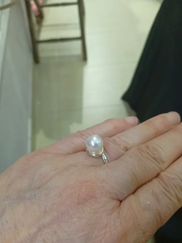 Anillo de acero con perla