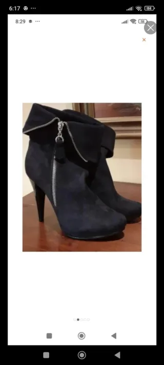 Stivaletti neri con tacco e zip