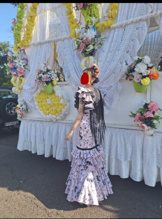 Traje de flamenca rosa y negro
