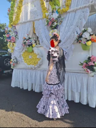 Traje de flamenca rosa y negro