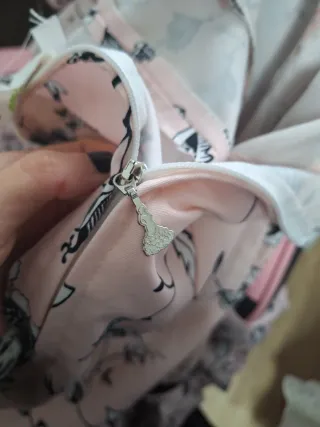 Traje de flamenca rosa y negro