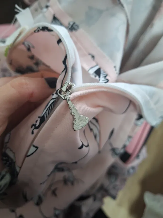 Traje de flamenca rosa y negro