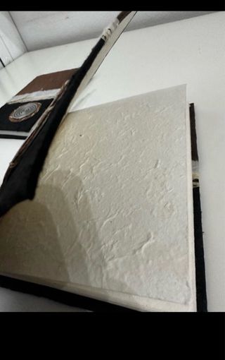 Lote agenda y libreta papel reciclado. 8€