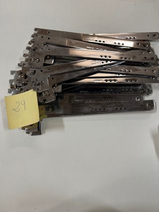 Ganchos metálicos panel expositor tienda