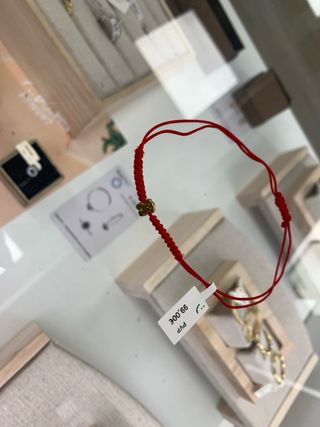PULSERA SWEET DOLLS TOUS ORO CON NYLON ROJO