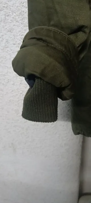 Parka verde forrada con pelo y gorro