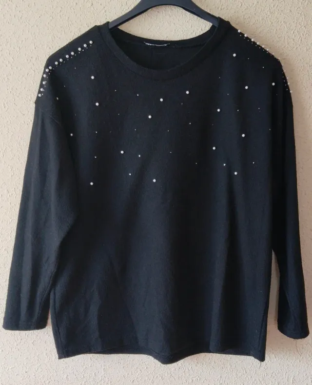 Jersey negro con perlas