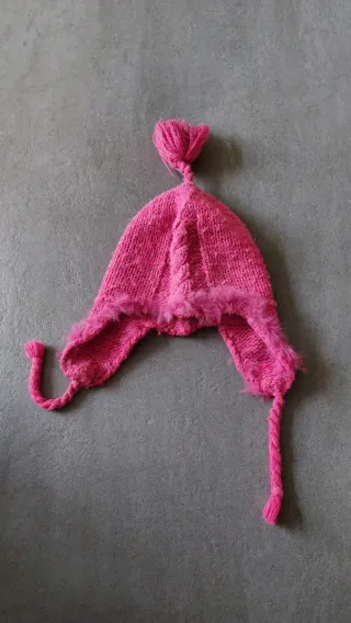 Cuffia bimba rosa con treccia