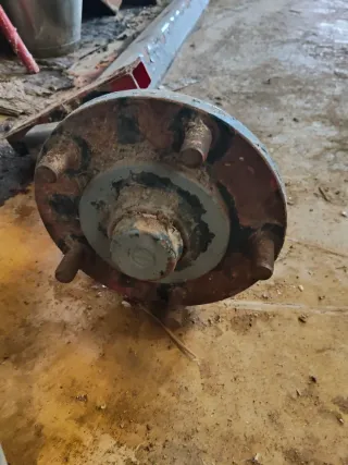 Eje de remolque con manguetas