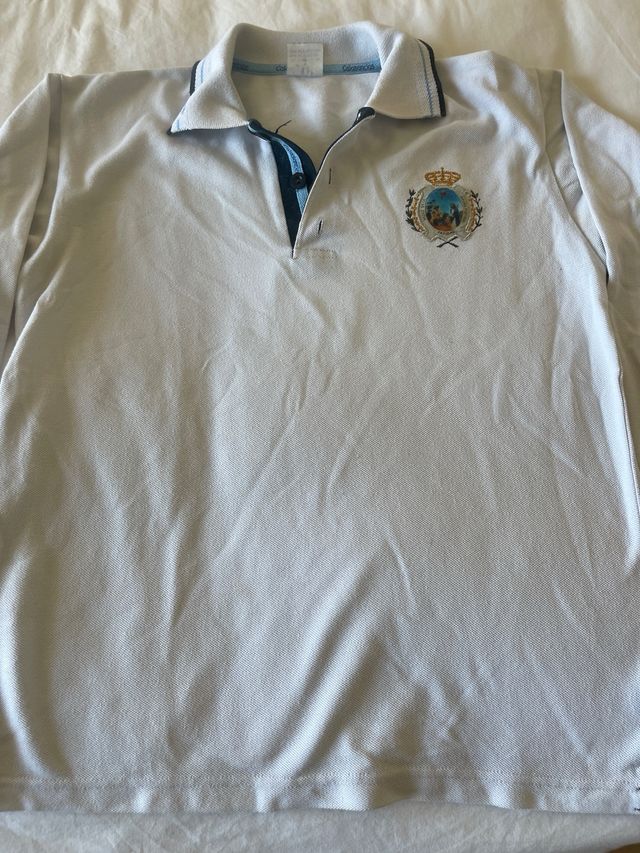 Lote calasancio 4 polosT-14 chaqueta T-16 35€