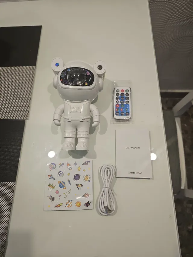 Astronauta proyector de estrellas