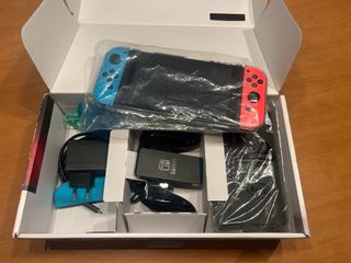 Nintendo Switch + Extras Azul/Naranja