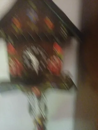 Orologio a cucù in legno dipinto a mano