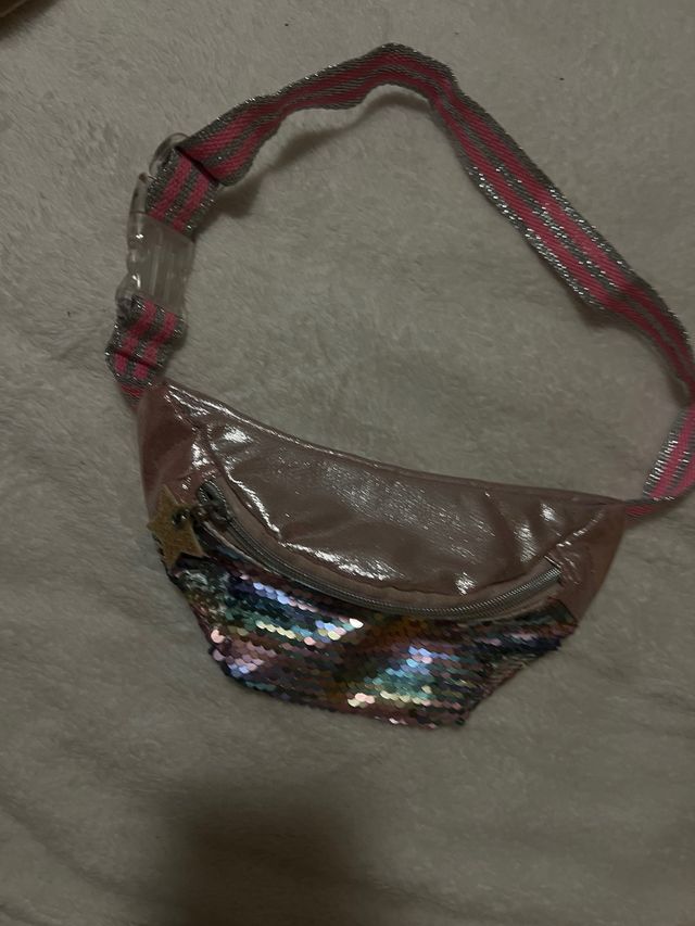 Riñonera brillante lentejuelas y estrella