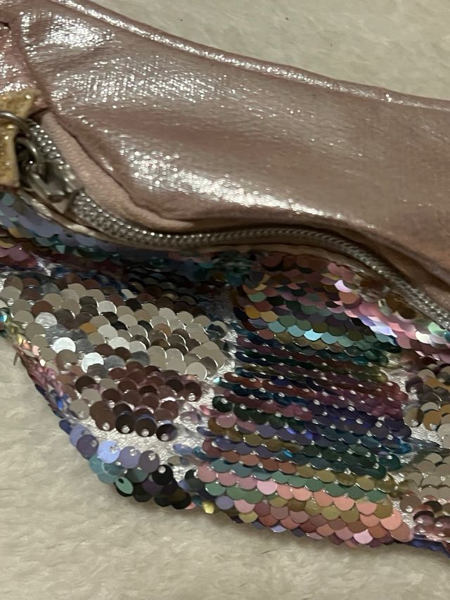 Riñonera brillante lentejuelas y estrella