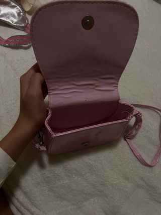 Bolso rosa con lazo brillante