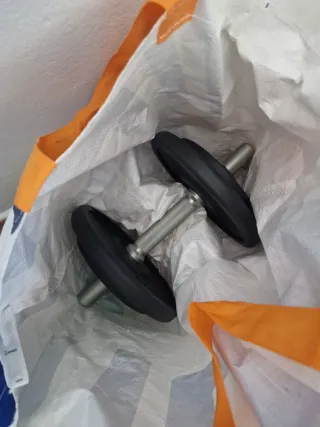 Banco de ejercicios plegable y pesas