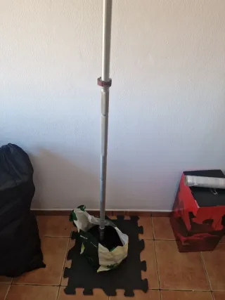 Banco de ejercicios plegable y pesas