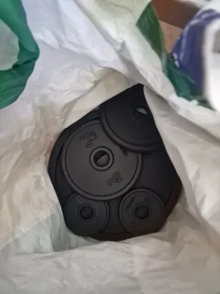 Banco de ejercicios plegable y pesas