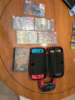 Nintendo Switch Oled Roja y Azul + Juegos + mando