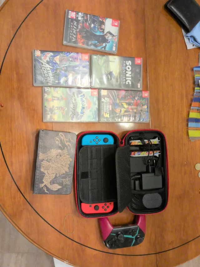 Nintendo Switch Oled Roja y Azul + Juegos + mando